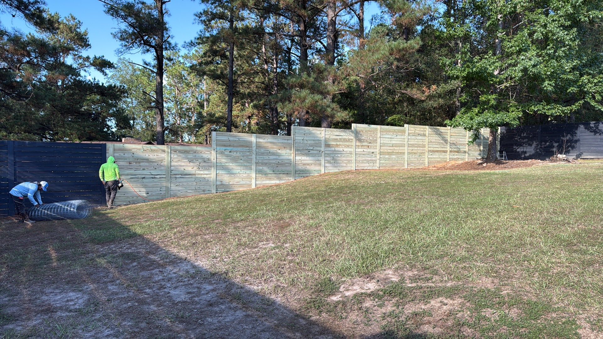 8ft Horizontal Privacy Fence Installation with Deck Boards in Gulfport, MS