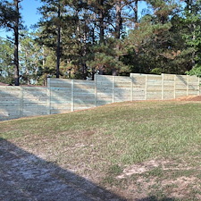 8ft-Horizontal-Privacy-Fence-Installation-with-Deck-Boards-in-Gulfport-MS 1